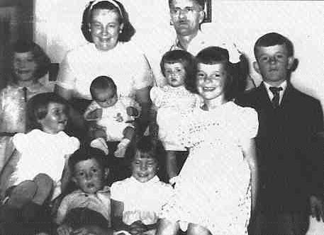 Jean-Paul Morisette and wife Lucienne, pictured with their eight children, including Pauline (front right with bow). The photo was taken only months before her father's death, later that year (1957).