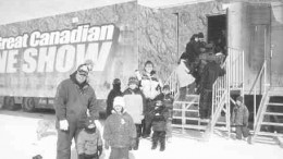 Visitors pose outside The Great Canadian Mine Show during a trip to Yellowknife, N.W.T. The show travelled 76,000 km in one year, and more than 40,000 guests witnessed its exhibits.