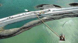 Draining of the A154 pool at the Diavik diamond mine, north of Yellowknife, began in late July. Water was pumped directly over the dyke into Lac de Gras until the water became too muddy. Since then, all pool water has been pumped to on-land containment facilities and treated at a plant owned by Diavik.