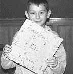 Trevor Smith shows off "Mineropoly."