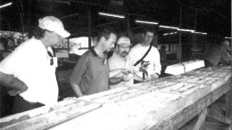 Malvin Spooner of Mavrix Funds, Kansanshi geologist Michael Stewart, Robert Lee of RBC Capital, and Craig Langdon of Deans Knight examine core at the Kansanshi copper project.