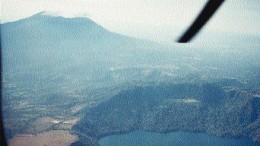 On the border between the Caribbean and Cocos tectonic plates, Nicaragua remains very active geologically. Shown above are examples of the numerous volcanoes and collapsed calderas seen throughout the 80-km-wide Nicaragua graben, which hugs the country's Pacific coast.