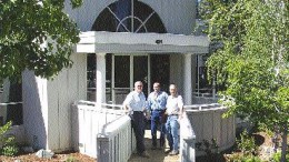 Photo by Barbara Thomae - Emgold President Bill Witte (left), Geologist Mark Payne and Emgold Director Ross Guenther stand in front of the company's headquarters in Grass Valley, Calif.