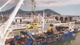 At the Cape Town docks in 1999, loading the NamSSol creepy crawler onto the deck of the mv Kovambo.