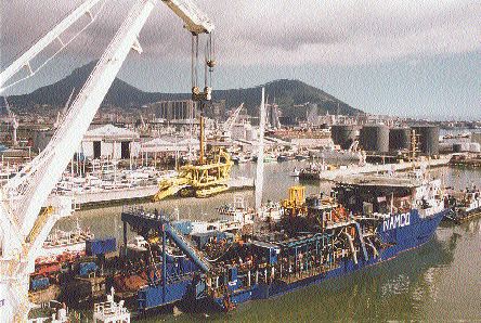 At the Cape Town docks in 1999, loading the NamSSol creepy crawler onto the deck of the mv Kovambo.