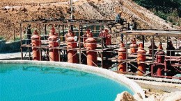 A carbon-adsorption plant at the Luxi open-pit, heap-leach gold mine in westernmost Yunnan province in China. The 5,000-oz.-per-year mine is co-owned by local and provincial government bodies.