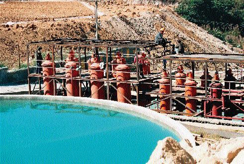 A carbon-adsorption plant at the Luxi open-pit, heap-leach gold mine in westernmost Yunnan province in China. The 5,000-oz.-per-year mine is co-owned by local and provincial government bodies.
