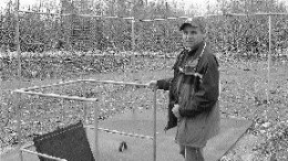 Eugne Gauthier, Northern Star's vice-president of exploration, stands over the opening of the Malartic Goldfields shaft no. 1.