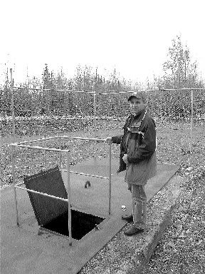 Eugne Gauthier, Northern Star's vice-president of exploration, stands over the opening of the Malartic Goldfields shaft no. 1.