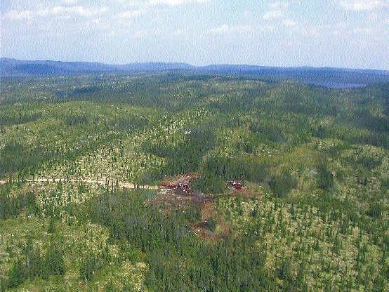 Aerial photo of bulk-sample core drilling into Ashton Mining of Canada's Renard 3 kimberlite. Inset: The three largest diamonds from the Renard 3 results announced in late January. Beginning at the top right and moving clockwise, the diamonds weigh 4.3 carats, 2.7 carats, and 2.29 carats.