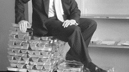 Modern-day Midas Robert McEwen, chairman and CEO of Goldcorp, seated on a portion of the company's gold inventory in February 2005.