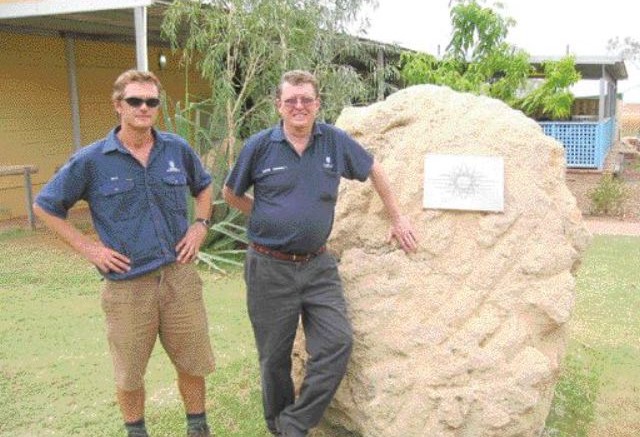 Kimberley Diamond Mine Manager Nick Algie (left) and Chairman Miles Kennedy stand beside one of the first pieces of diamondiferous lamproite ore mined from Pipe 9 at the Ellendale operation in Western Australia.
