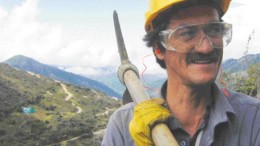 A worker holds a mattock at Greystar Resources' 10-million-oz. Angostura gold property near Bucaramanga, in Santander department, Colombia.