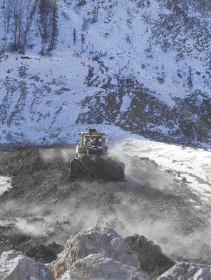 SARAH HURSTA dozer moves along the dry stack tailings facility at the Pogo gold mine in Alaska. The tailings are at one of the windiest locations on the mine site.