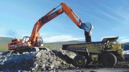 PINE VALLEY COALA backhoe loads a truck at Pine valley Coal's Willow Creek mine in northeastern B.C. where the company recently learned that its coking coal pit there contained three times more oxidized coal than had been anticipated.