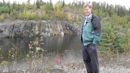 THE NORTHERN MINERRobin Dunbar, president of Mustang Minerals, stands near the flooded Maskwa open pit, northeast of Winnipeg in 2004.