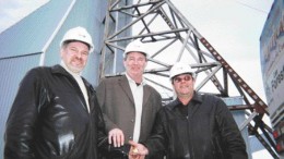 BY SUSAN KIRWINAnyone lose a button? From left: Yves Gagnon, Serge Roy and Ghislain Morin hold the last 6 oz. of gold poured at the Bachelor Lake mill in 1989. The mill is currently undergoing a $3-million facelift and will be ready to take ore from the Barry Lake open-pit deposit by mid-August.