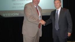 Meridian Gold president and CEO, Ed Dowling (left), and Yamana Gold chairman and CEO, Peter Marrone, share congratulations after reaching agreement on Yamana's increased takeover offer.