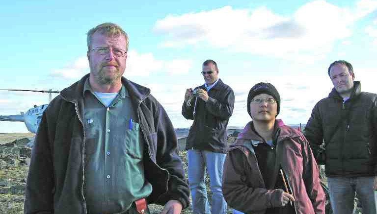At Canadian Royalties' Nunavik Nickel project in far northern Quebec, from left: Canadian Royalties vice-president of exploration Grant Arnold; MinQuest Capital analyst Michel Marier; Desjardins Securities research associate Sophie Chung; and Charles Riopel, an advisor with Socit gnrale de financement du Qubec. Staff writer Susan Kirwin visited Nunavik and her story is one of three northern site visits inside.
