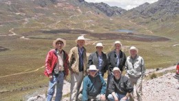 BY STEPHEN STAKIWNorthern Peru Copper's team at the Galeno project in Peru in early 2006: (back row, from left) senior geologist Carlos Miranda; country manager Hal Waller; president and CEO Marshall Koval; vice-president of exploration Leo Hathaway; and director Tony Floyd. In front is project manager Jeff O'Toole (left) and vice-president of corporate development David Strang. The main deposit and exploration camp are in the background.