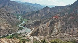 BY JOHN CUMMINGAt Mediterranean Resources' Tac property in Turkey, looking south from Karsibayir Tepe to the T-6 Valley and Sezai Ridge gold zones in the right foreground. To the left is the Coruh River valley, which is slated to be flooded above the road level in order to generate power at a planned dam, 18 km downstream.