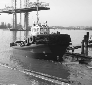 THE NUMAS WARRIOR BERTHING TUG WILL BE STATIONED IN PORT HARDY, B. C., TO ASSIST 80,000-TON CAPACITY PANAMAX CLASS BULK CARRIERS IN AND OUT OF THE SHIPLOADING BERTH AT POLARIS MINERALS' ORCA QUARRY. THESE FREIGHTERS TRANSPORT SAND AND GRAVEL FROM THE QUARRY ON NORTHERN VANCOUVER ISLAND TO READY-MIX CONCRETE CUSTOMERS IN SAN FRANCISCO AND HAWAII.