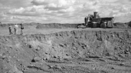 A truck and loader work at Athabasca Minerals' Susan Lake aggregates pit, 85 km north of Fort McMurray, Alta.