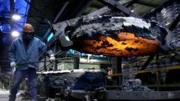 A worker smelts ferromolybdenum at Thompson Creek Metals' Langeloth Metallurgical Facility, located 40 km west of Pittsburgh, PA.