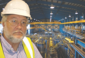 Pedro Martinez Recio, process supervisor at Iberian Minerals' Aguas Tenidas mine in Spain, stands above the ever-improving polymetallic circuit.
