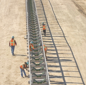 Construction workers build a conveyor at Barrick Gold's Cortez Hills gold mine in Nevada.