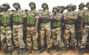 Nigerois soldiers prepare for a training mission in Maradi, Niger. The country's military recently staged a coup d'etat, leaving the country's mining sector unsure of the implications.