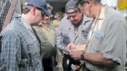 Examining core at Pacific North West Capital's River Valley PGM project in Sudbury, Ontario. From left: vice-president of exploration Ali Hassanalizadeh, project geologist Richard Zemoroz and technical advisers John Londry and Gordon Trimble. Photo by Pacific North West Capital