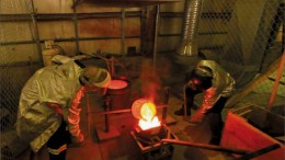 Workers pour gold at Bralorne Gold Mines' Bralorne mine near Gold Bridge, British Columbia. Photo by Bralorne Gold Mines