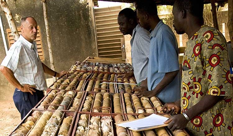 Geologists study drill core at Endeavour's Hound project in  Burkina Faso. Source: Endeavour Mining
