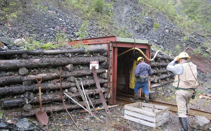 Men walk into an adit at the Wellgreen PGM-nickel-copper project in the Yukon. Credit: Prophecy Platinum