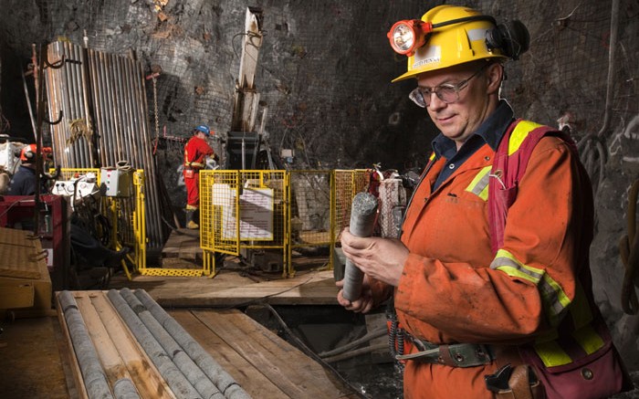 Geologist David Penna studies drill core at North American Palladium's Lac des Iles mine located in northwestern Ontario. Credit: North American Palladium
