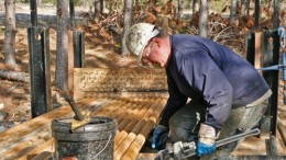A worker handles drill rods at Duluth Metals and Antofagasta's Twin Metals copper-nickel-PGM project in Minnesota. Credit: Duluth Metals