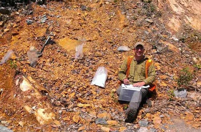 Dave Smith, Wallbridge Mining's JV manager, sampling at the North Range PGM project, where project partner Lonmin has recently invested $1 million for exploration. Credit: Wallbridge Mining