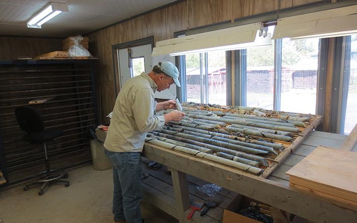 Peter Harvey, senior project geologist, examines core samples at Temex Resources and Goldcorp's Whitney gold project in Ontario. Source: Temex Resources