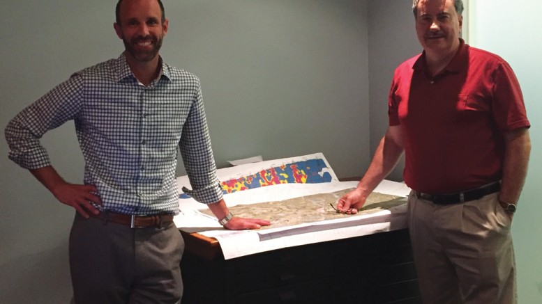 Mark Wheeler (left), Treasury Metals’ director of projects, and Paul Dunbar, exploration manager, planning exploration at the Goliath gold project, 20 km east of Dryden in northwestern Ontario. Credit: Treasury Metals.