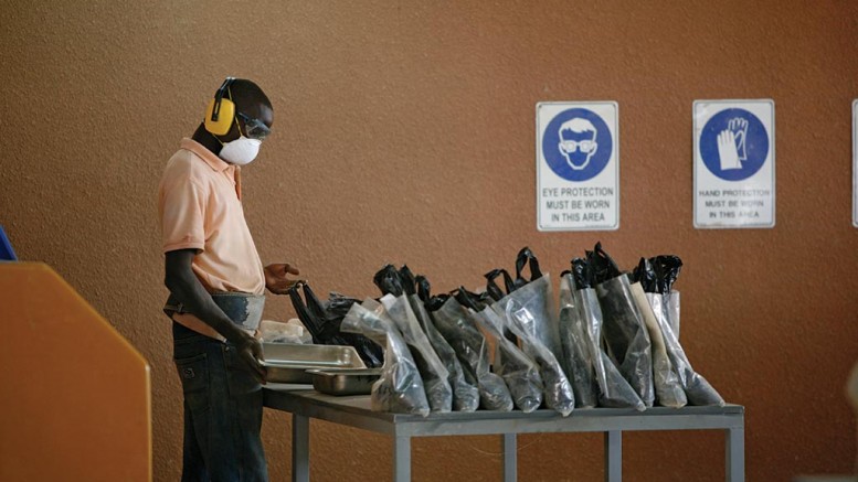 Bagging samples at the Bomboré gold project in Burkina Faso. Credit: Orezone Gold.