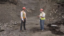 Northern Miner western editor Matthew Keevil visits Alexco Resource's (TSX: AXR; NYSE-MKT: AXU) president and CEO Clynton Nauman at the site of the proposed underground portal for the Flame & Moth discovery at the historic Keno Hill silver property in the Yukon Territory. Credit: Yukon Mining Alliance.