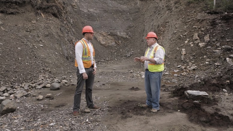 Northern Miner western editor Matthew Keevil visits Alexco Resource's (TSX: AXR; NYSE-MKT: AXU) president and CEO Clynton Nauman at the site of the proposed underground portal for the Flame & Moth discovery at the historic Keno Hill silver property in the Yukon Territory. Credit: Yukon Mining Alliance.