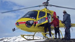 Shawn Ryan (far right) carrying early spring staking in the Yukon. Photo by Shawn Ryan.