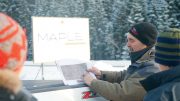Fred Speidel, Maple Gold Mines’ vice-president of exploration, holds a map at the Douay gold project in Quebec’s Abitibi greenstone belt. Credit: Maple Gold Mines.