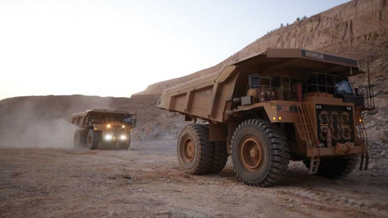 Trucks in the pit at Essakane. Credit: Iamgold.