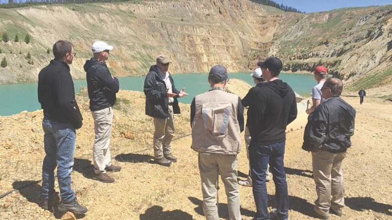 Pete Blakeley (facing camera), Revival Gold’s general manager, addresses visitors near the South Pit at the historic Beartrack gold project in Idaho. Credit: Revival Gold.