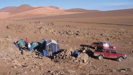 An exploration camp and Cornerstone Capital Resources’ personnel at the Miocene gold-silver-copper property in Chile. Newcrest Mining holds an option to earn up to 75% of the project. Credit: Cornerstone Capital Resources.