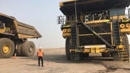 Ewan Downie — president and CEO of Thunder Bay, Ontario-based Premier Gold Mines — beside trucks at Premier’s 40%-owned South Arturo gold mine in Elko County, Nevada, where majority partner Barrick Gold is operator. Credit: Premier Gold Mines.