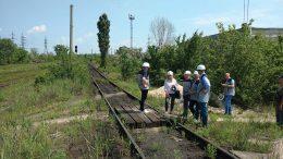 Examining rail infrastructure built alongside Black Iron’s Shymanivske iron ore deposit near Kryvyi Rih, Ukraine. Photo by John Cumming.